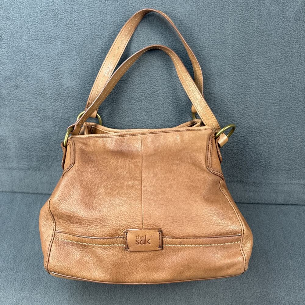 The SAK Tobacco Genuine Leather w/Peace and Doves Design Inside Tote Bag